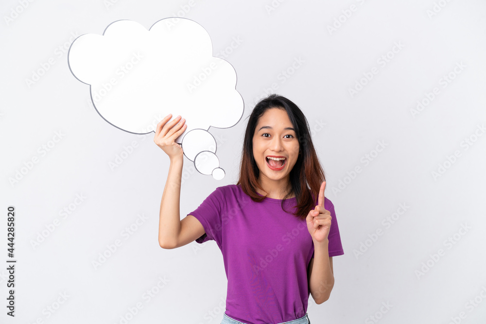 Young Vietnamese woman isolated on white background holding a thinking speech bubble Young Vietnamese woman isolated on white background holding a thinking speech bubble
