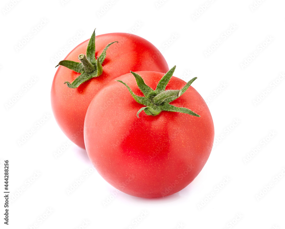 Ripe red tomatoes isolated on a white background. Ripe red tomatoes isolated on a white background.
