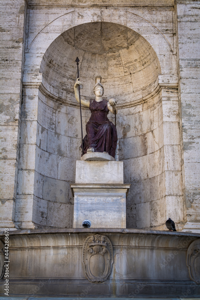 Statue of Minerva, the goddess of wisdom and war, in front of the Palazzo Senatorio (Senatorial Palace) in The Piazza del Campidoglio on top of the Capitoline Hill in Rome, Italy