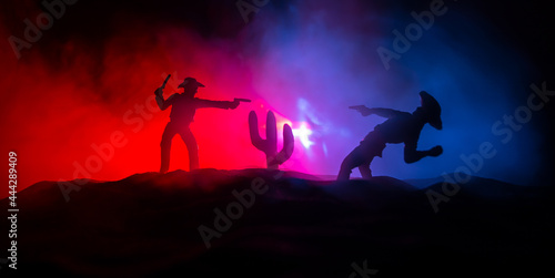 Western cowboy silhouette with texture at sunset and slivers of light