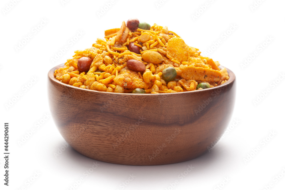 Close up of Teekha Meetha crunchy spicy Indian namkeen (snacks) In hand-made (handcrafted) wooden bowl Close up of Teekha Meetha crunchy spicy Indian namkeen (snacks) In hand-made (handcrafted) wooden bowl