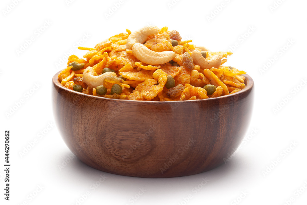 Close up of corn flex mixture Indian namkeen (snacks) In hand-made (handcrafted) wooden bowl Close up of corn flex mixture Indian namkeen (snacks) In hand-made (handcrafted) wooden bowl