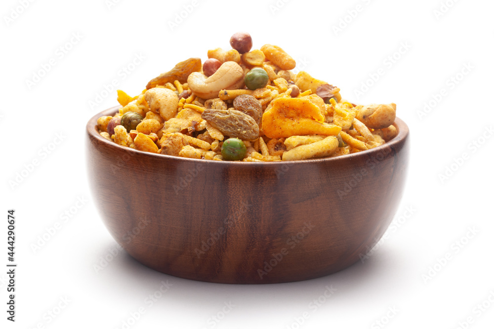 Close up of corn flex mixture Indian namkeen (snacks) In hand-made (handcrafted) wooden bowl Close up of corn flex mixture Indian namkeen (snacks) In hand-made (handcrafted) wooden bowl
