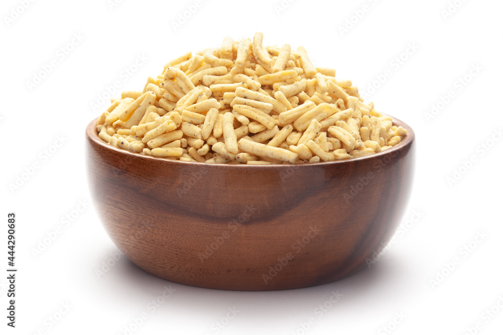 Close up of Ratlami Besan sev plane and salty Indian namkeen (snacks) In hand-made (handcrafted) wooden bowl Close up of Ratlami Besan sev plane and salty Indian namkeen (snacks) In hand-made (handcrafted) wooden bowl
