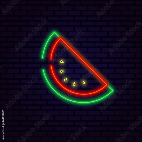 Neon watermelon. Brick wall background