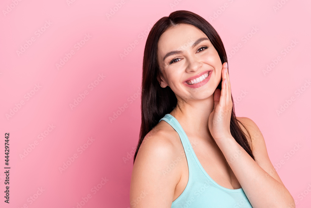 Photo of friendly brown long hairdo beauty lady apply cream wear blue top isolated on pastel pink color background