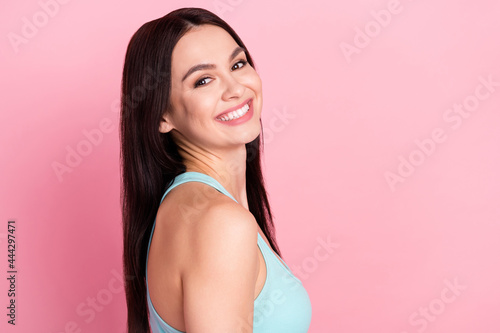 Profile photo of sweet brown long hairdo beauty lady look camera wear blue top isolated on pastel pink color background