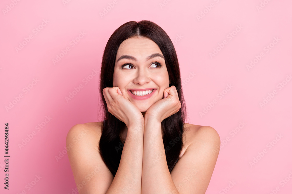 Photo of dreamy brown long hairdo lady look empty space see advert without clothes isolated on pastel pink color background Photo of dreamy brown long hairdo lady look empty space see advert without clothes isolated on pastel pink color background