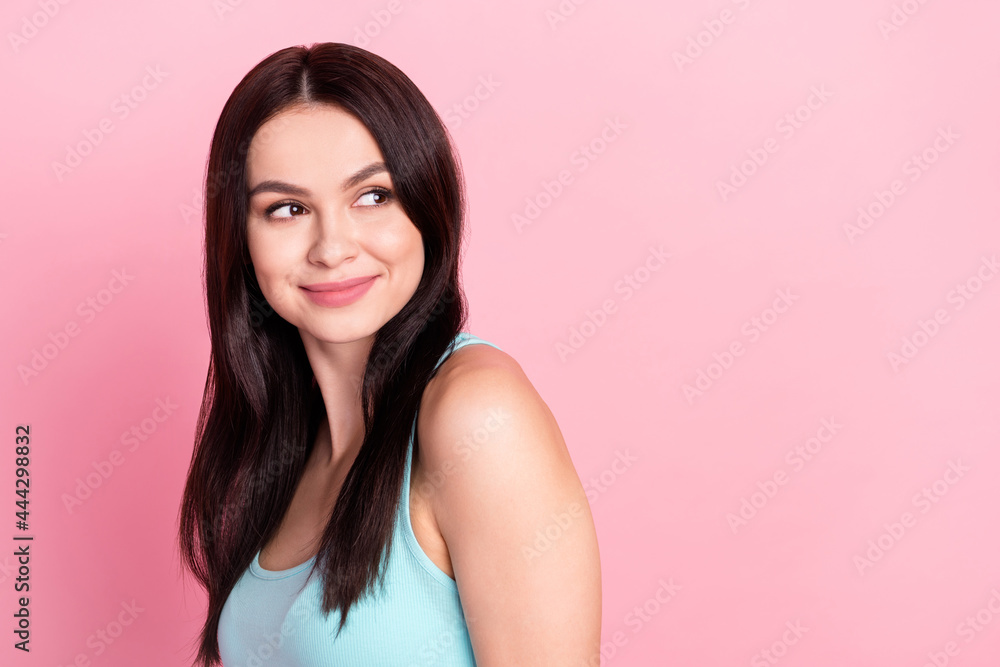 Profile side photo of young attractive girl happy positive smile look empty space isolated over pink color background Profile side photo of young attractive girl happy positive smile look empty space isolated over pink color background