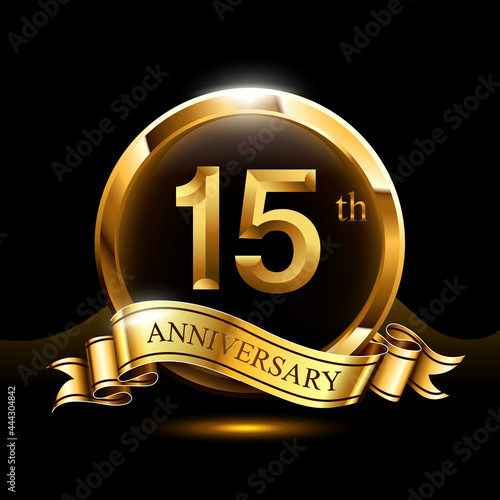 15 years golden anniversary logo celebration with ring and ribbon.