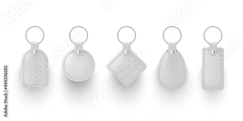 Collection realistic white leather keychains vector illustration. key chains with metallic ring