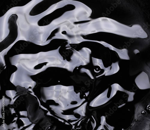 abstract black background of liquid asphalt bitumen photo