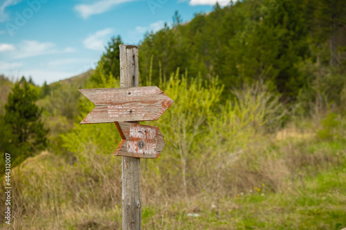 Mountain view , road and a sign