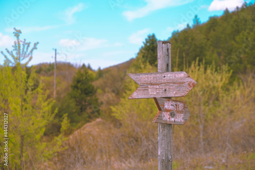 Mountain view , road and a sign