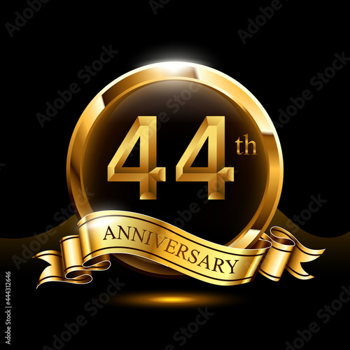 44 years golden anniversary logo celebration with ring and ribbon. photo