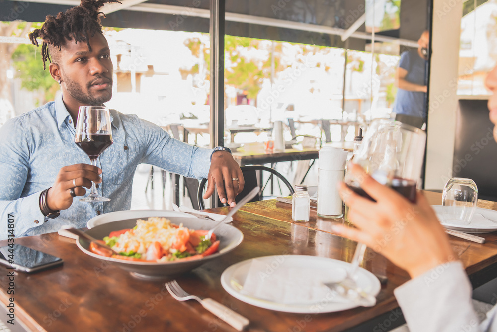 Couple having a date at a restaurant. Couple having a date at a restaurant.