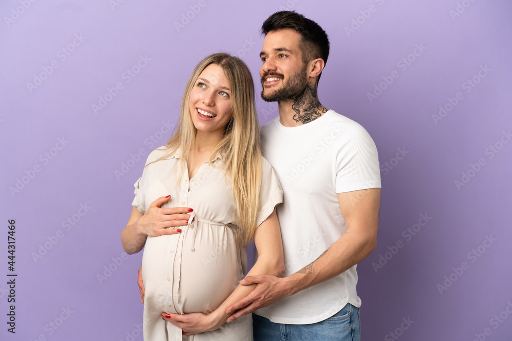 Young couple pregnant and happy Young couple pregnant and happy