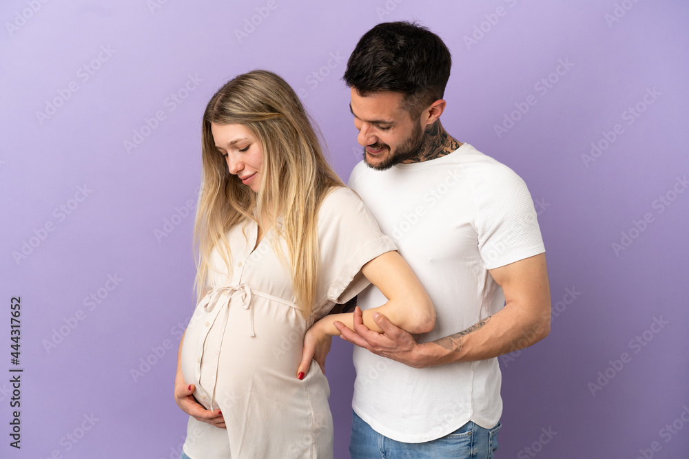 Fototapeta premium Young couple pregnant