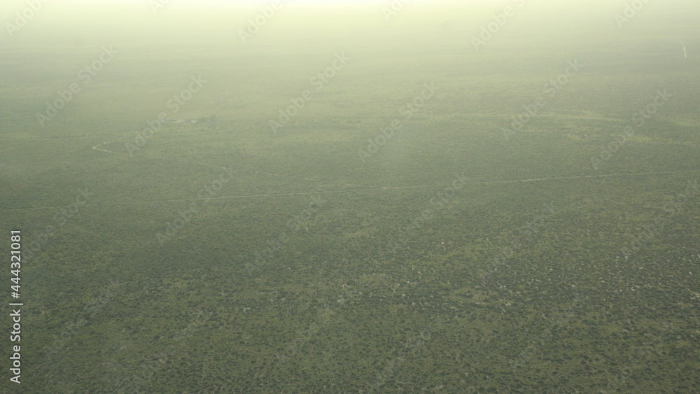 fog over the town, view from a plane fog over the town, view from a plane
