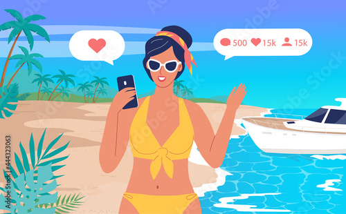 Cute girl taking photo on the tropical island beach