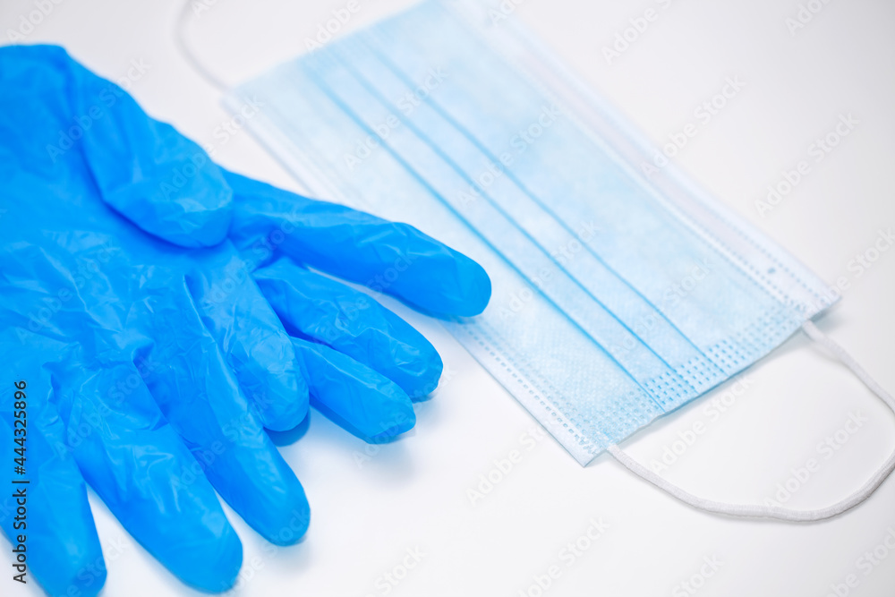 Medical gloves and mask, the concept of protection against the new coronavirus infection COVID-19 Medical gloves and mask, the concept of protection against the new coronavirus infection COVID-19