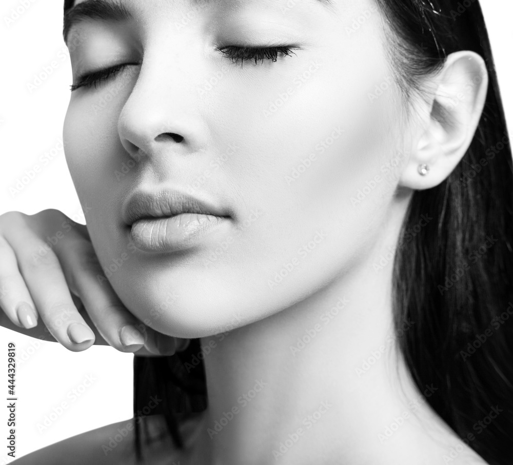 Fototapeta premium Young brunette woman with perfect makeup and skin.