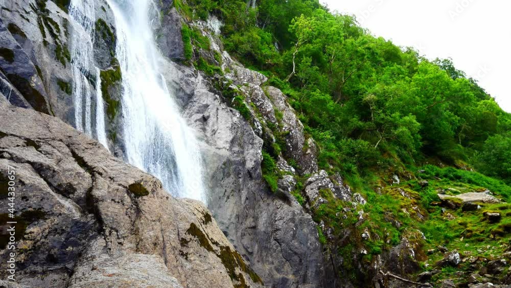 Aber falls lush flowing water Snowdonia mountain Welsh national park waterfall Aber falls lush flowing water Snowdonia mountain Welsh national park waterfall