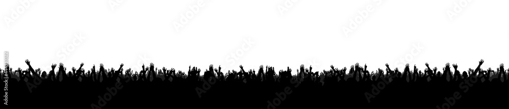 Fototapeta premium Hands at a concert, silhouettes against stage lighting. Summer concert.