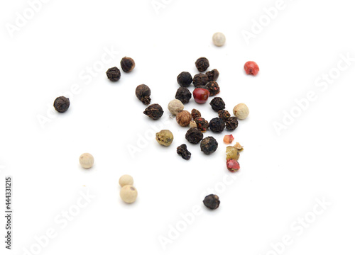 Red and black peppercorns, isolated on white background 