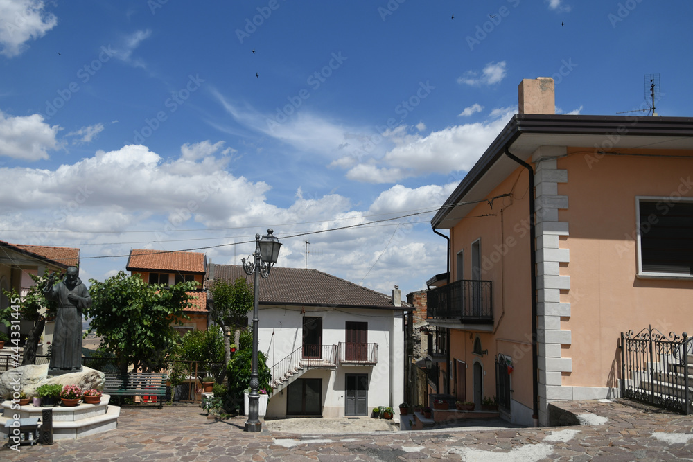 Vallata, Italy, July 3, 2021. A street between the old houses of a medieval village in Campania region.