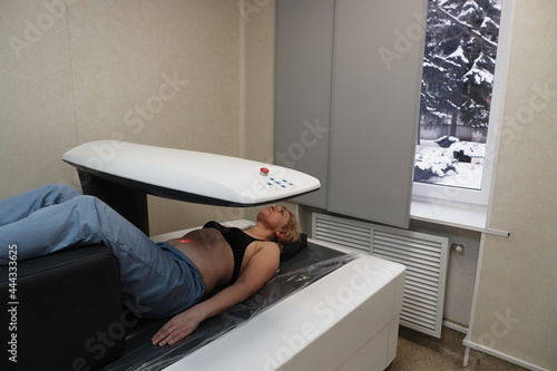 Investigation of the density of human bones using an osteodensitometry apparatus.