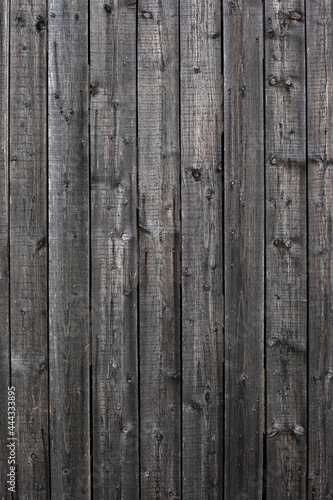 Wood wooden brown, grey with plank texture wall background. Wooden surface of the vertical boards. Background for design and presentations.