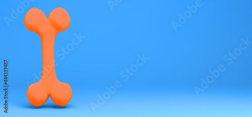 Orange bone floating on blue background. Banner. Abstract.3D illustration. photo