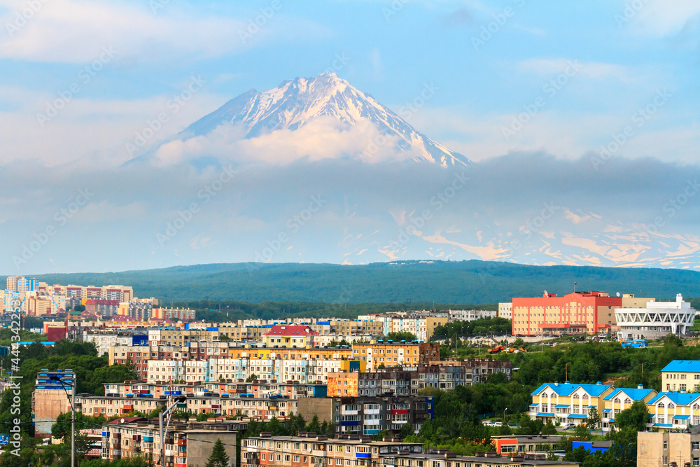 View of the city Petropavlovsk-Kamchatsky on background of Koryaksky Volcano. Russian Far East, Kamchatka Peninsula.