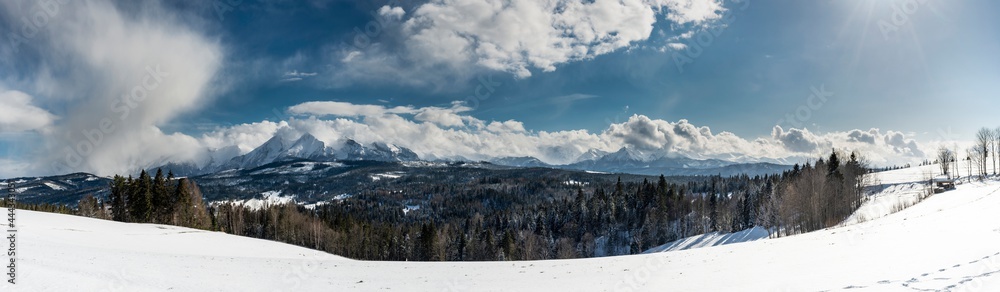 Beautiful winter landscape with a view of the Tatra Mountains