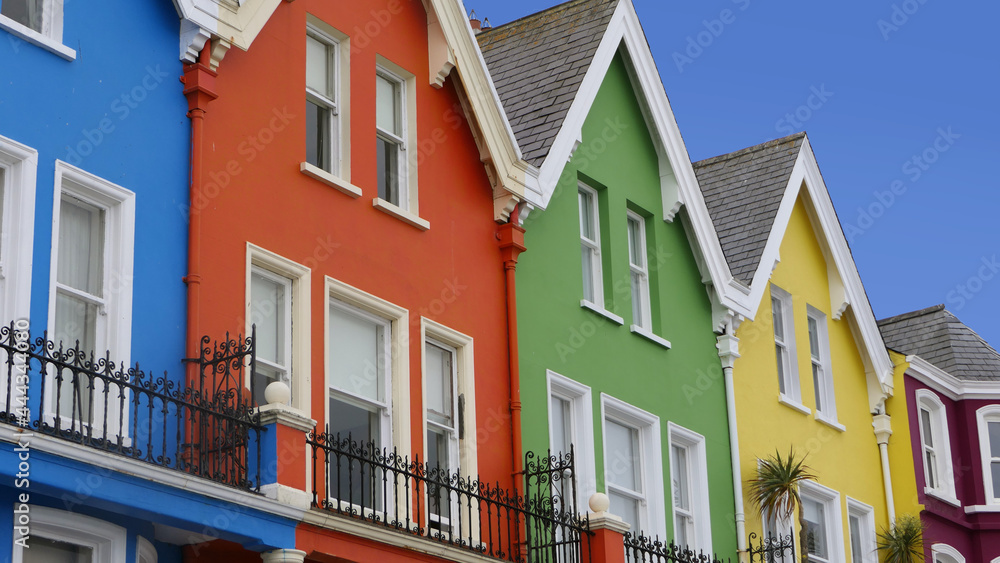 Yellow Red Orange Green Blue sky houses by the sea Whitehead N. Ireland