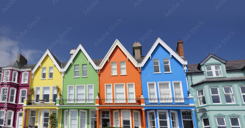 Yellow Red Orange Green Blue sky houses by the sea Whitehead N. Ireland