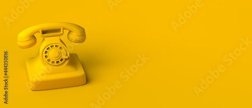 Vintage telephone on yellow background. 3d illustration. Banner. Copy space.