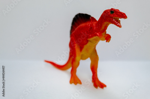 Red dinosaur. Huge and terrifying dinosaur. Kid toy. © Yes Camacho