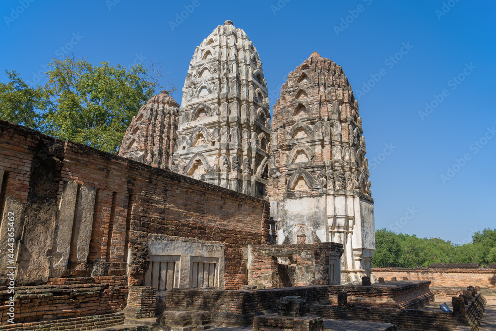 Ancient Khmer temple of  Wat Si Sawai in the historical park of Sukhothai city on a sunny day. Thailand