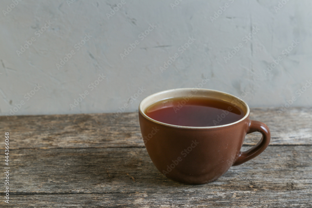 Cup of tea on an old wooden table Cup of tea on an old wooden table
