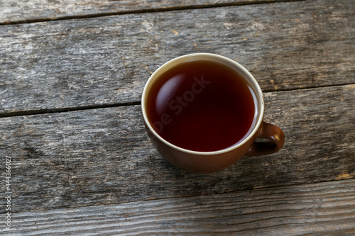 Cup of tea on an old wooden table