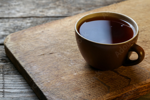 Cup of tea on an old wooden table