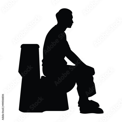 Young man sitting in the toilet bowl silhouette on white background