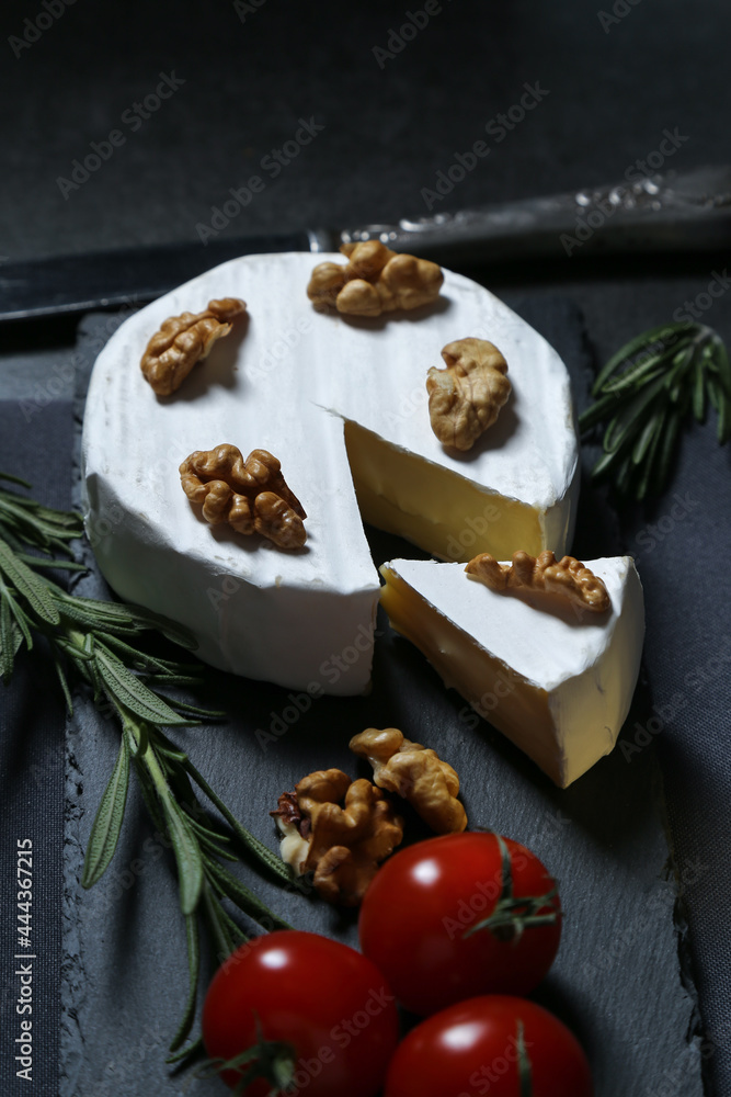 Still life with cheese on a dark background Still life with cheese on a dark background