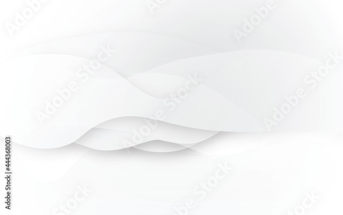 Soft smooth white lines curving to form a surface of light and shadow. White and gray modern abstract technology background. Abstract white and grey on light silver background modern design.