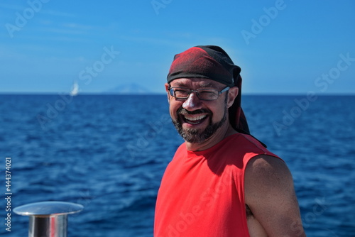 Portrait of handsome mature man on a boat