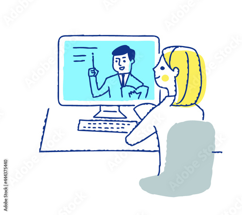 デスクトップパソコンを使う若い女性