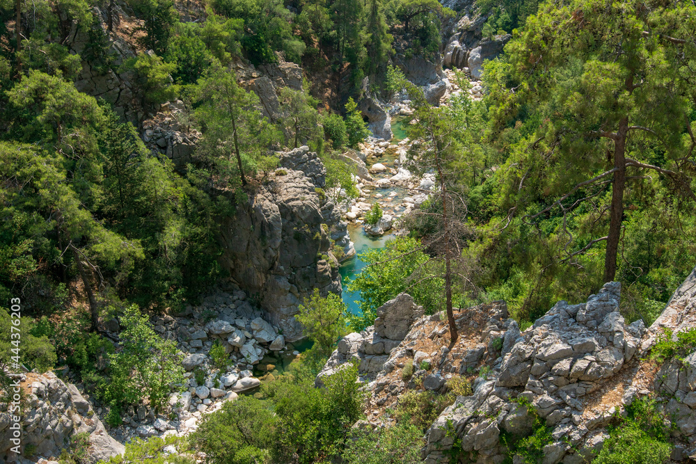 A canyon with a hiking trail. Mountain river. Part of the Lycian trail through the mountain range.