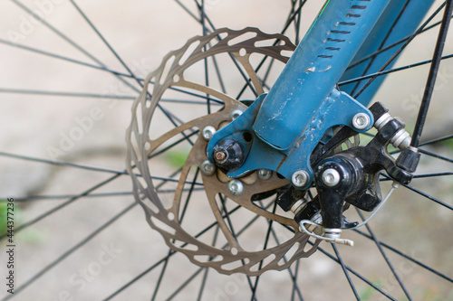 brake disc of the front wheel of a road bike close-up